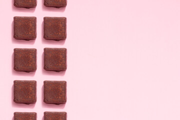 Fototapeta premium Handcrafted chocolate praline bonbons. Delicious dessert pattern