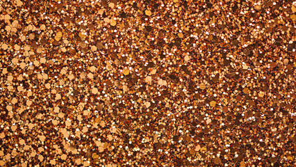 Abstract festive golden glitter textured background