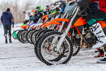 Fototapeta premium motorcycle wheels on start line winter motocross