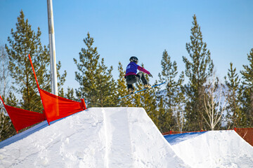 athlete snowboarder jump in snowboard competition