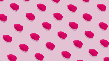 Magenta make-up sponges PATTERN on pink background Beauty Cosmetics Space for text