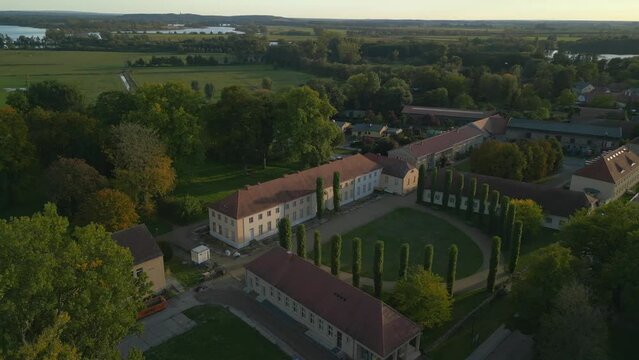Paretz castle manor with front yard cypresses Beautiful aerial view flight drone