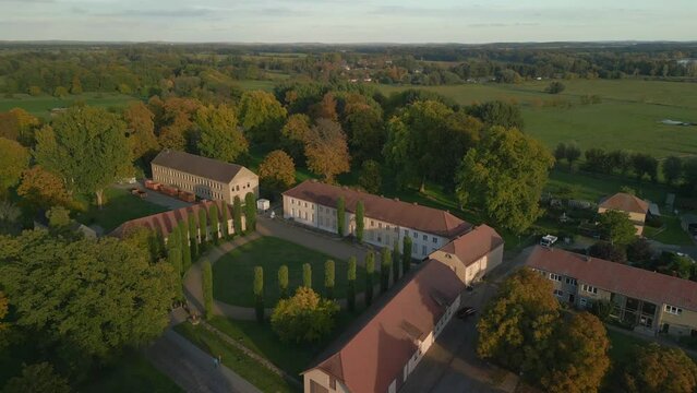 panorama Classicist castle in german village. Marvelous aerial view flight drone