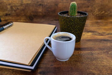 Coffee and books on a office desk