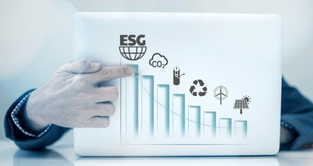 Businessman touching virtual screen. ESG environmental social governance concept. Business strateg - obrazy, fototapety, plakaty