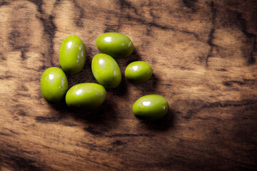 fresh green olives lie on a wooden table, generative AI