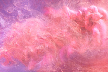 Gentle Pink abstract ocean background. Splashes, drops and waves of paint under water, clouds of...