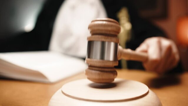 Judge Issues Sentence with wooden gravel 