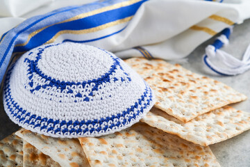 Passover celebration concept. Matzah, red kosher and walnut. Traditional ritual Jewish bread...