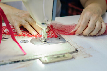 Obraz premium Fashion designer creating wedding dress stock photo