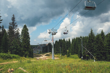 ski lift and scenic mountain road with amazing panoramic view of national park Kopaonik - famous...