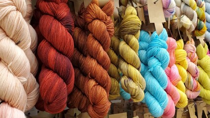 Close up of braided colorful crocheting threads on display