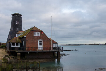 Obraz premium view of old historic mill at Langstone Harbour