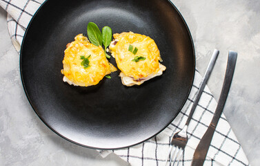 Meat in French - baked meat with ananas, onion, cheese and mayonnaise