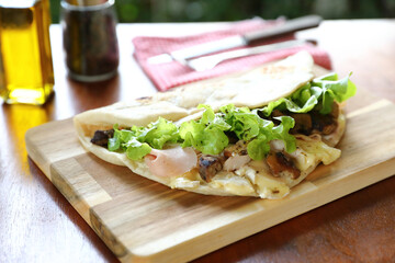 Italian cuisine , Piadina with Italian ham and cheese