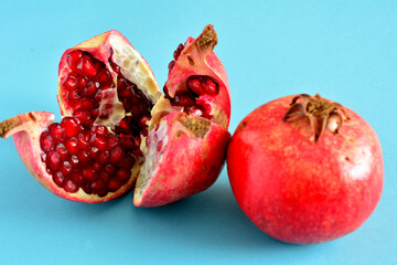 fresh garden pomegranate with seeds isolated, close-up