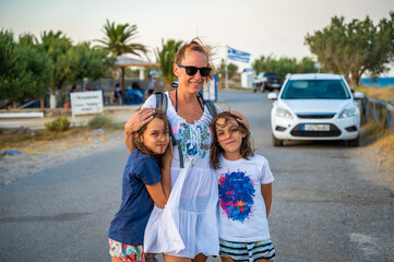 Family with kids tourists portrait standing on beach, Xerokampos, Crete, Greece.