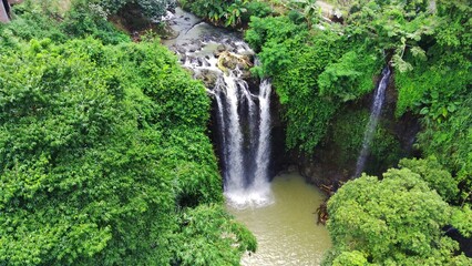 Fototapeta na wymiar the natural freshness of the Curug or waterfalls Gondoroiyo in Semarang. Indonesia. Long Exposure photography.