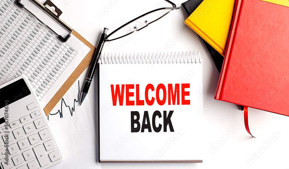 Poster welcome back text on notebook with clipboard and calculator on white background
