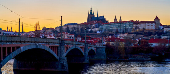 Arched Manes Bridge and the landmarks of Mala Strana district on the Petrin Hill, Prague, Czechia