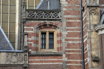 Amsterdam Oude Kerk Church Exterior Close Up with Window and Sculpted Details, Netherlands