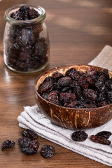 Healthy Food - Nuts Dehydrated Grapes; Photo On Wooden Background