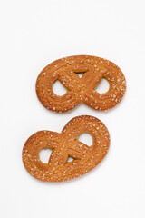Two figured shortbread cookies with crystal sugar isolated on white background top view