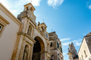 Fototapeta na wymiar Exterior arch and towers of Palazzo del Sedile palace in Matera, Basilicata, Italy - Europe