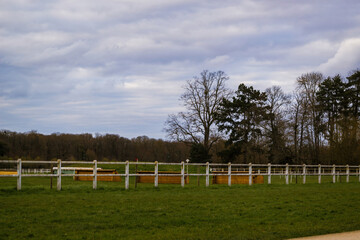 white fence in the field