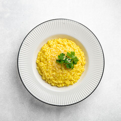 Risotto alla milanese, italian dish, top view
