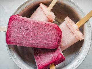 Homemade, bright ice cream on the table. Close-up, view from above. Tasty and healthy eating concept