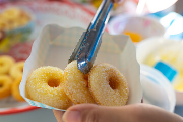 Mini Donut Sugar brown, Fresh donuts in cooling rack.