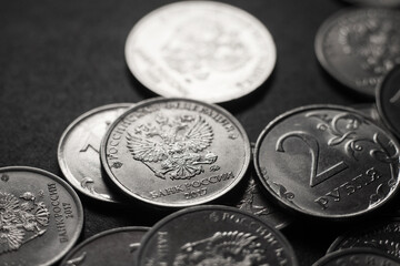 Russian rubles close-up on black background. Financial sanctions against Russia. The collapse of...