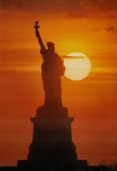 statue of liberty at sunset © Patricia