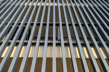 Metal facade on a modern building. Texture of metal bars.