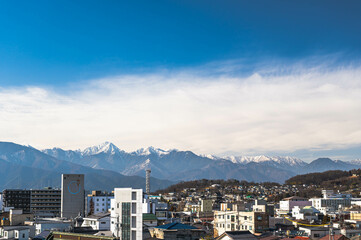冬の松本の街と北アルプス　