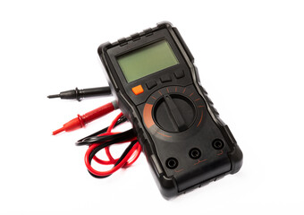 Black digital multimeter with probes isolated on white background. Multimeter is an electronic measuring instrument. Business and profession electrician. Electric concept tool.