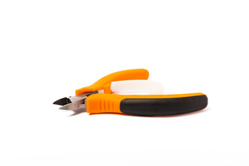 Wire cutters with orange handles isolated on white background