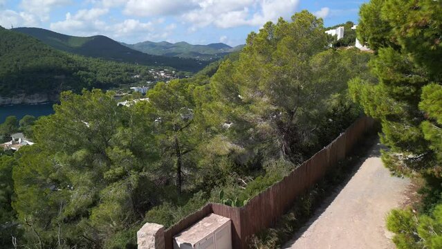 Ibiza mountain road villa beautiful beach view. Amazing aerial view flight drone
