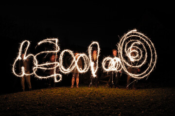 Creative symbols drawing in long exposure 