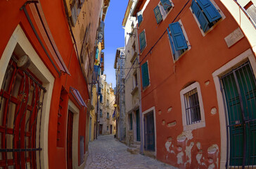 Fototapeta na wymiar Streets of Rovinj with calm, colorful building facades, Istria, Rovinj is a tourist destination on Adriatic coast of Croatia