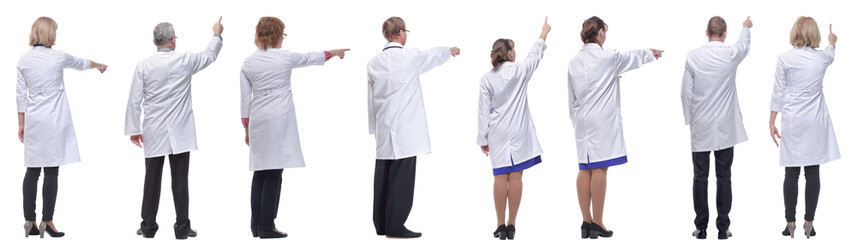 group of doctors standing with their backs isolated