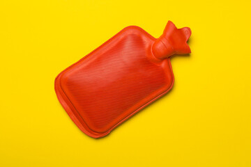 Rubber water warmer bag on color background