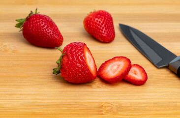 Fresh sliced strawberries. Organic fruit, healthy diet and nutrition concept.