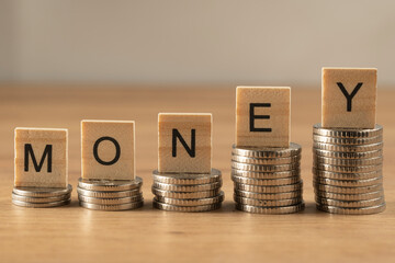 Wooden cubes on a wooden background with the inscription 