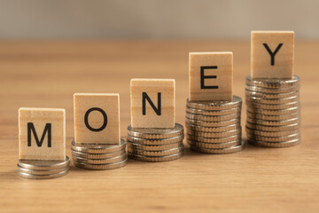 Wooden cubes on a wooden background with the inscription 