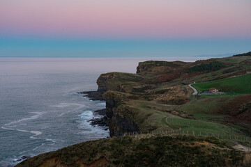 Fototapeta na wymiar Arnuero cliffs at twilight in Cantabria coast. North of Spain.