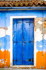 old door at a facade