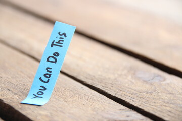 Motivational quotes inscription on a tag.