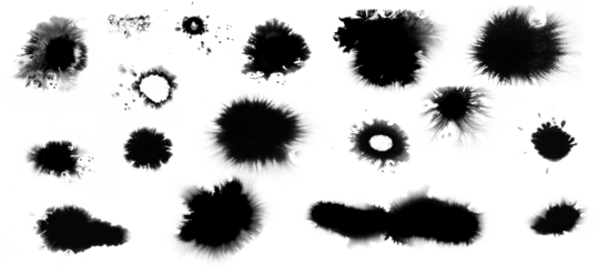 Collection of small and large black dried ink spots or inkblots